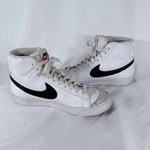 Nike White High-Top Sneakers with Black Swoosh